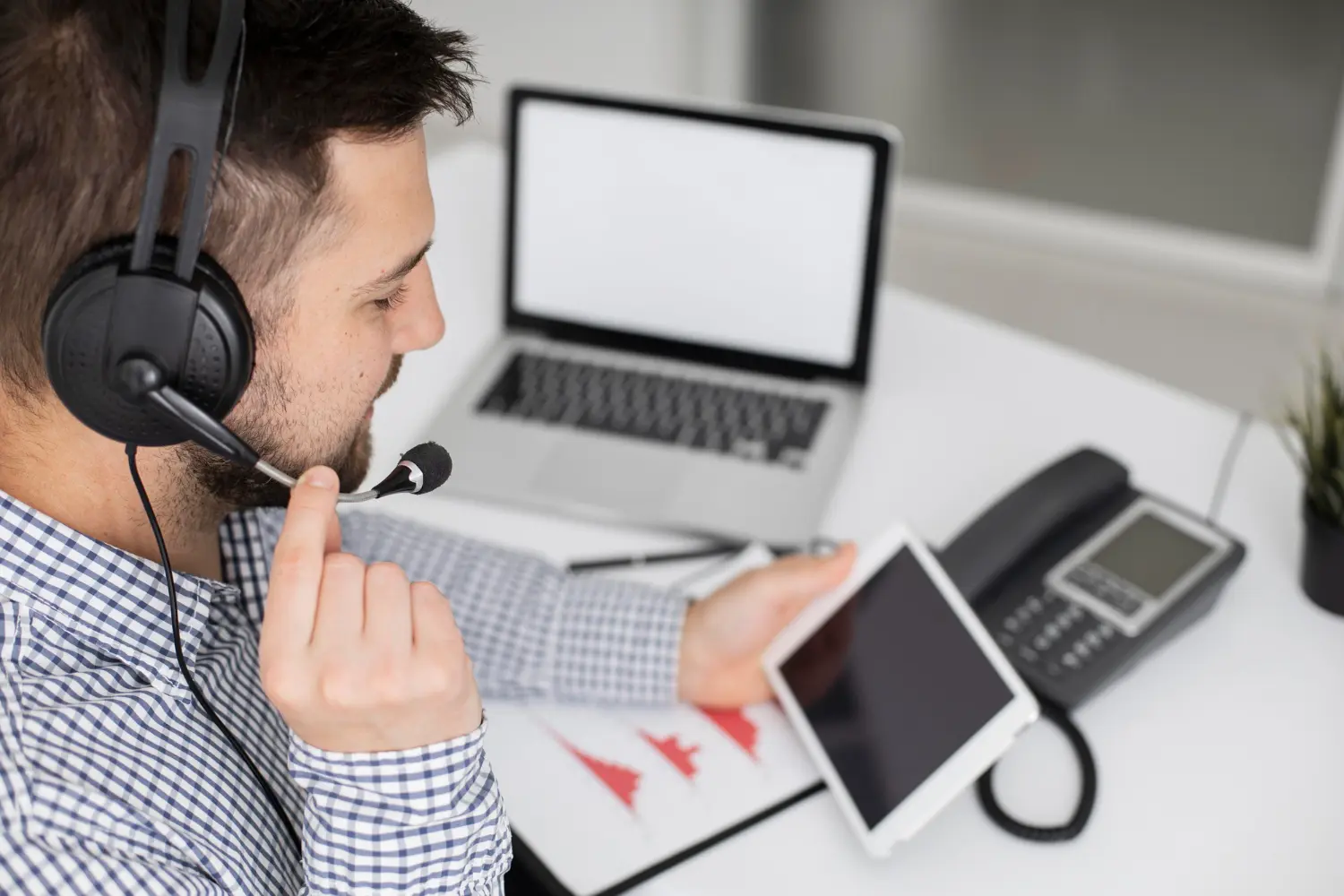 Businessman talking on the phone for Voip phone system installation