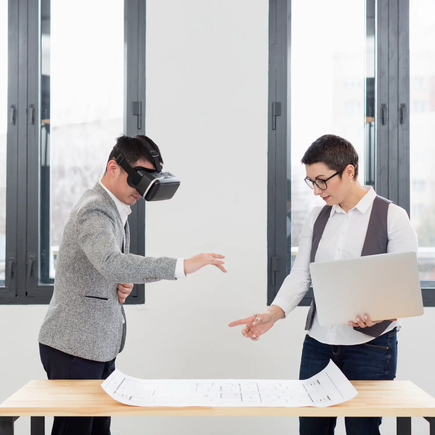 a man wearing a vr with a woman for ai consulting for small businesses