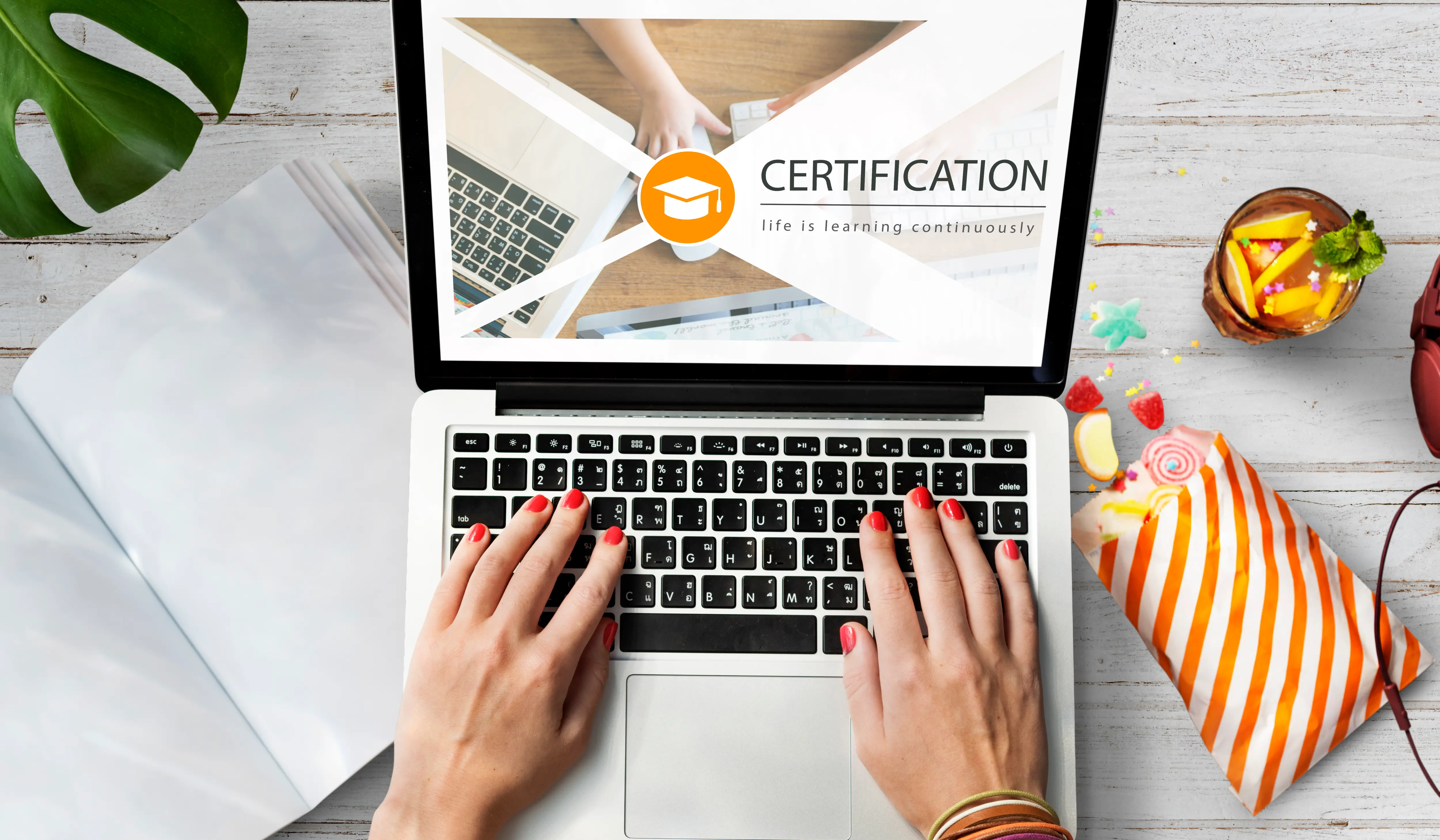 A man searching for what is cmmc certification on a laptop