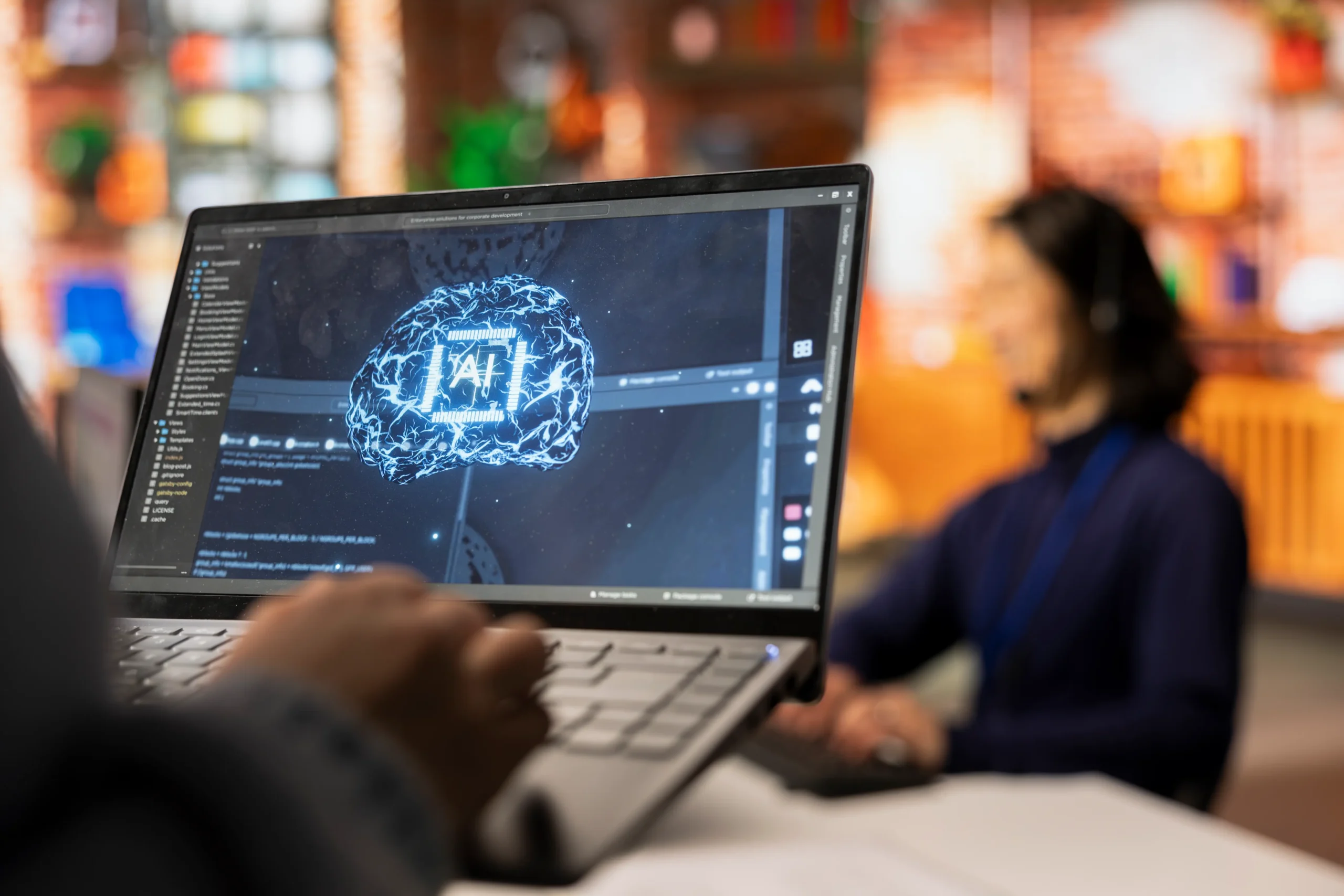 A worker-using laptop for AI business process management consulting