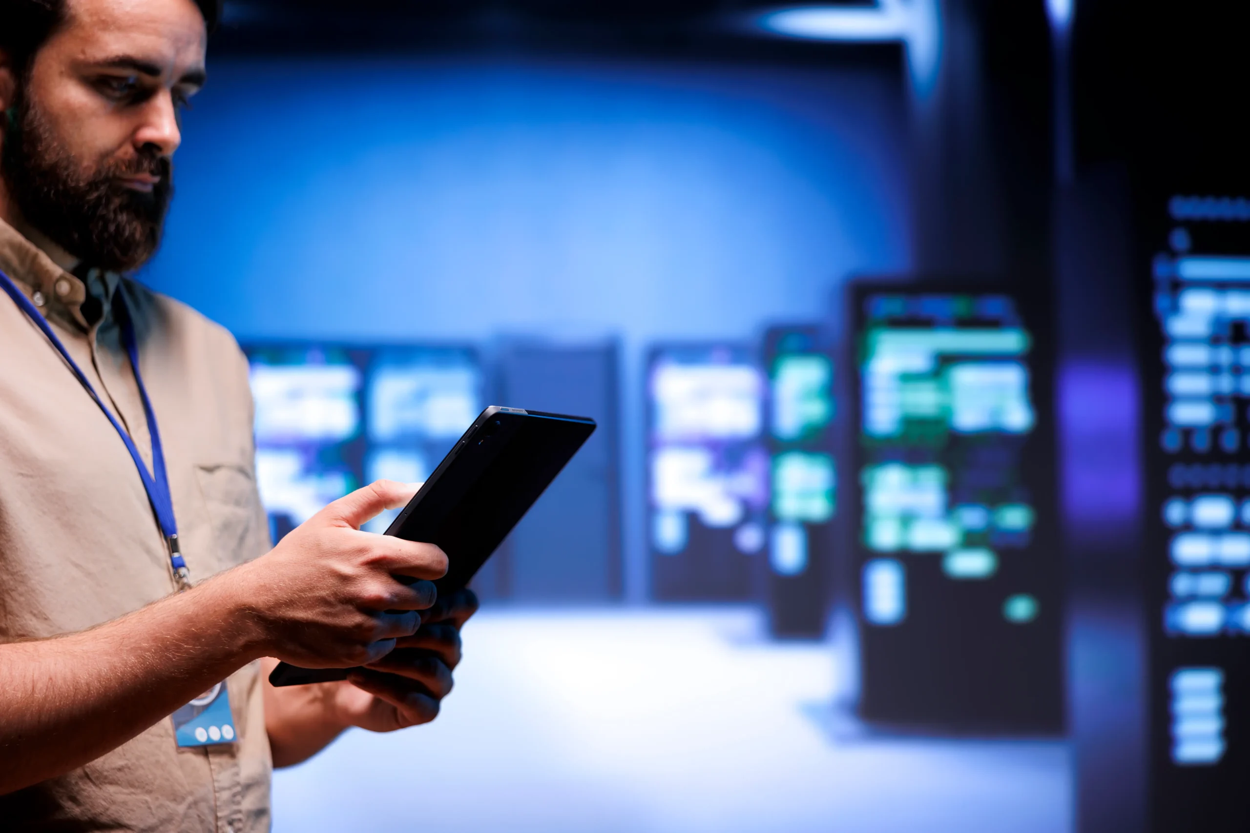 A certified Comptia Server specialist checking his tablet