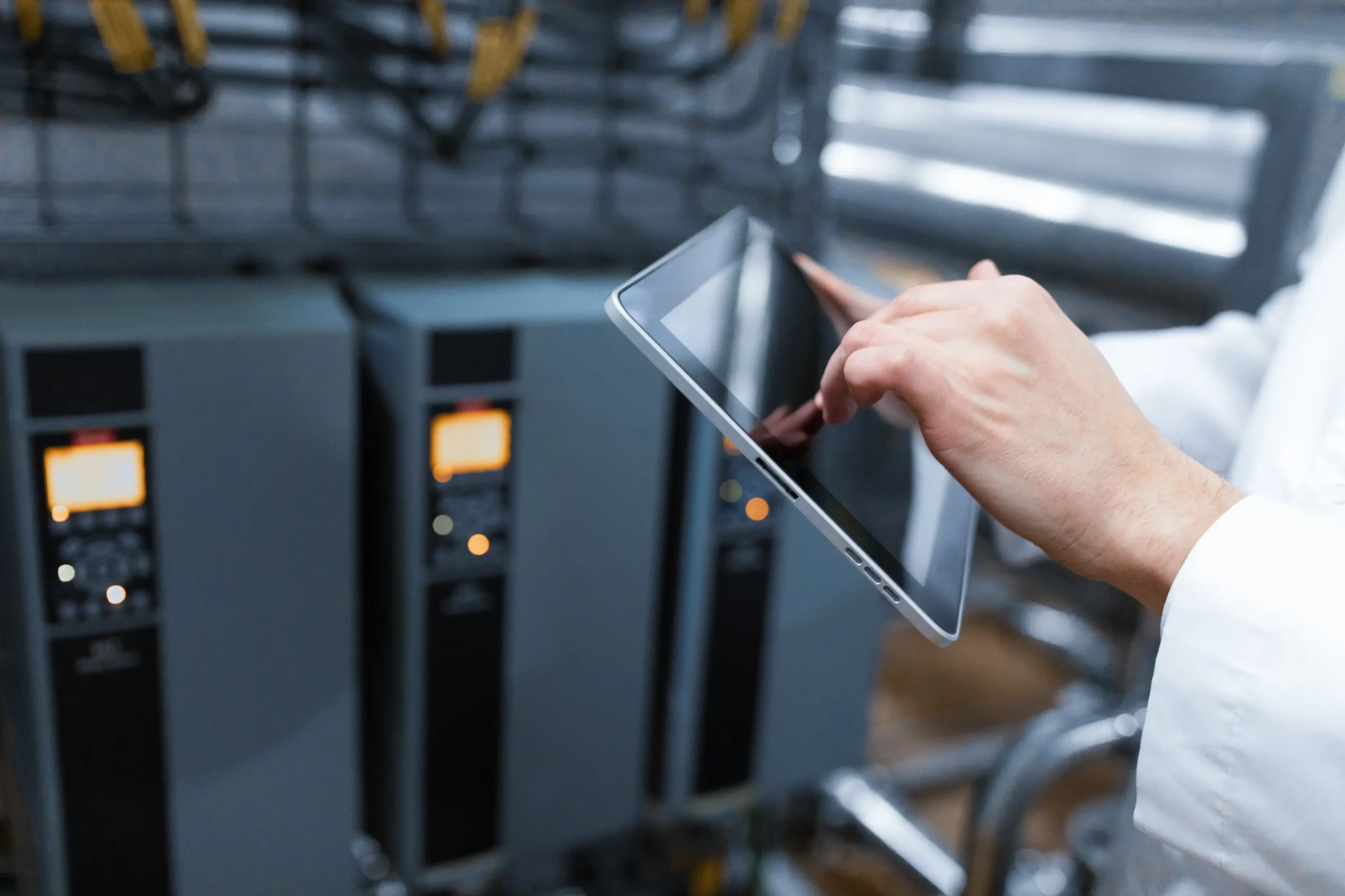 An expert server certified CompTIA in server holding a tablet