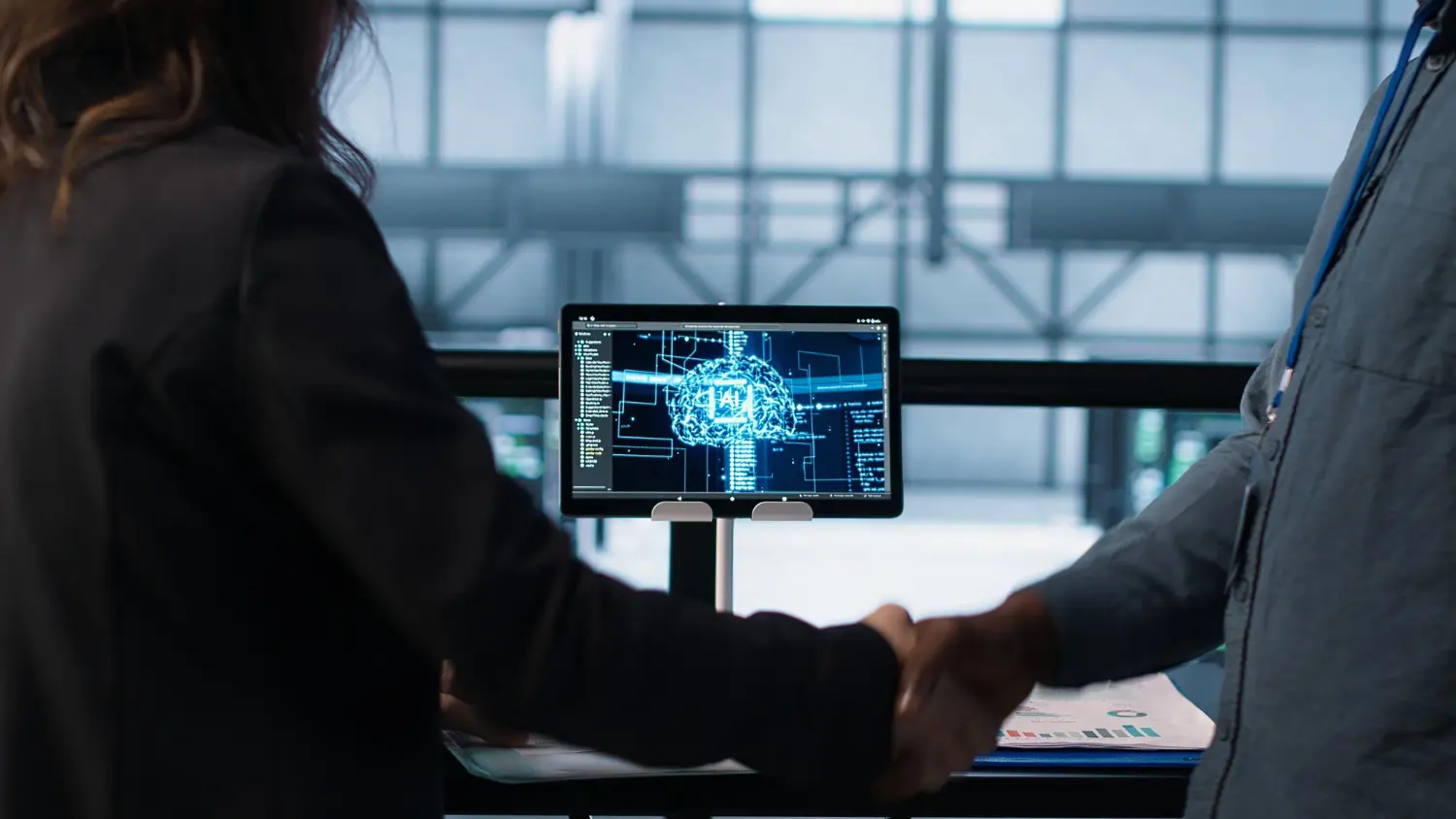 Business owners interacting with AI business automation in Everett