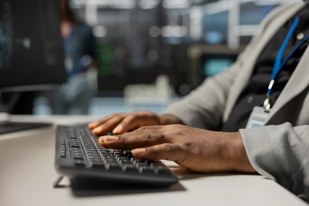 Managed IT Services Kalispell Expert typing on a keyboard